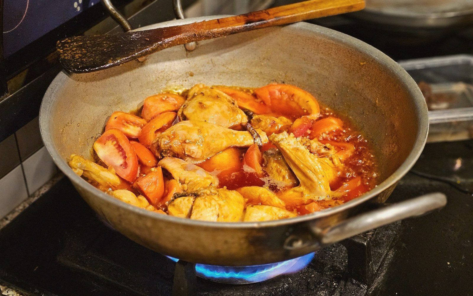 A poach holds just under a simmer, the surface barely shivering.